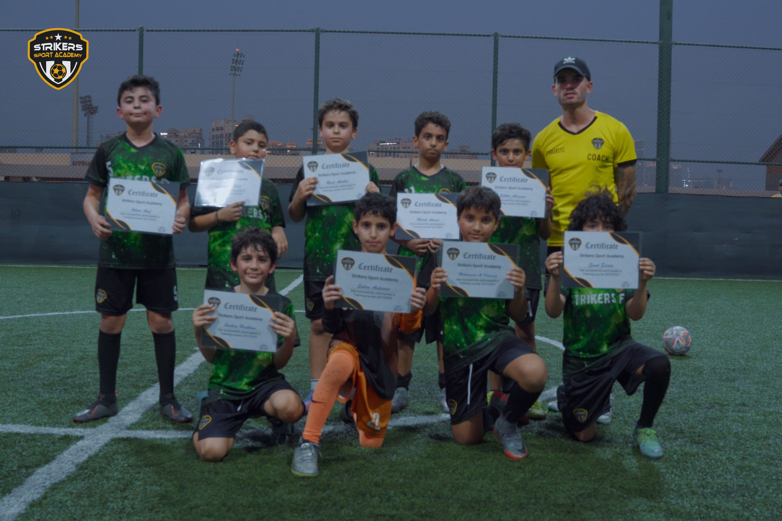 Strikers team with certificate